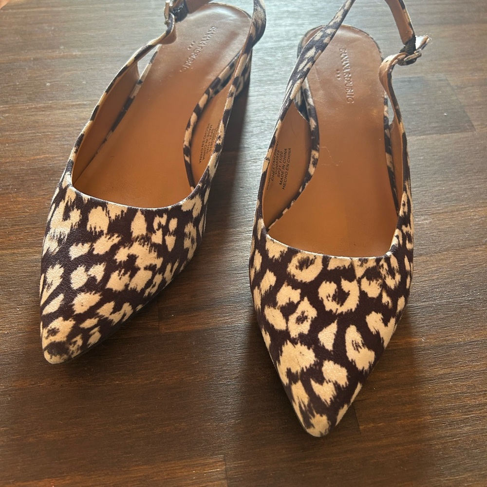 Banana Republic block heel sling back cheetah print shoe.